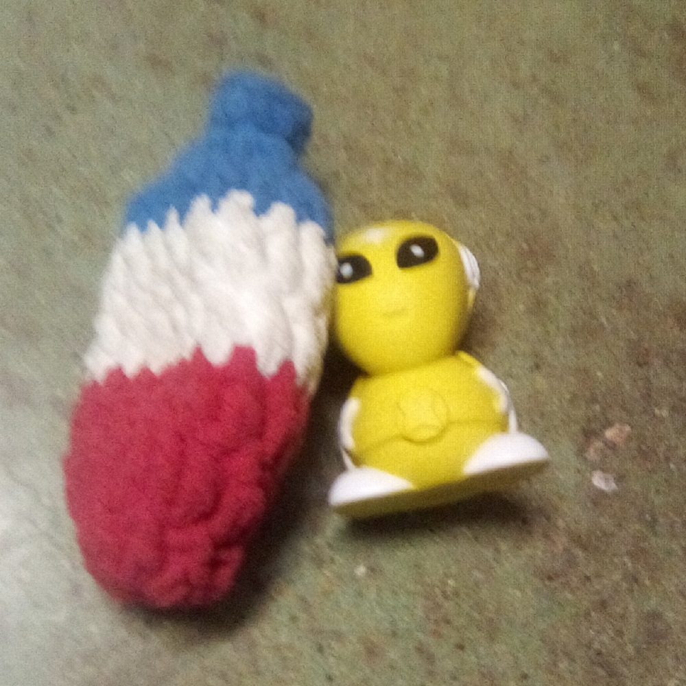 Yellow Alien Toy with Knit Reusable Water Balloon